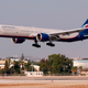 This picture taken on August 3, 2020 shows an Aeroflot-Russian Airlines Boeing 777-3M0 landing at Israel’s Ben Gurion International Airport in Lod, east of Tel Aviv.